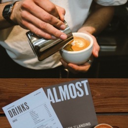 man holding a cup of coffee