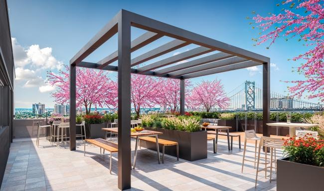 Enjoy our resident-only features a patio with tables and chairs