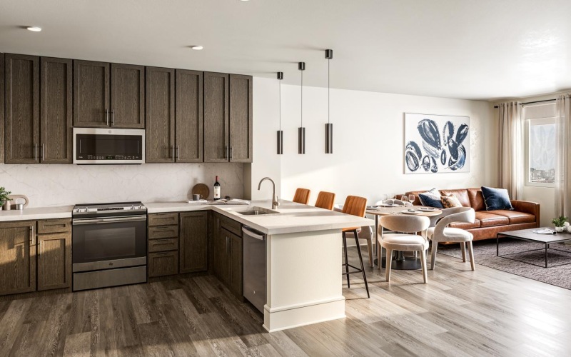 a kitchen with a couch and a table